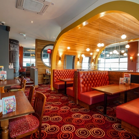 Interior dining area of a pub.