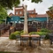 The exterior beer garden seating area with the venue in the background at The Two Greens.