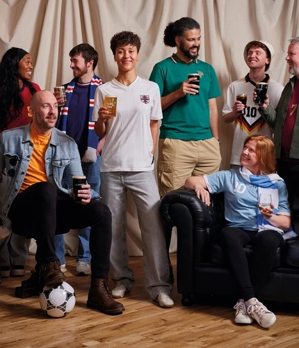 A banner promoting the Football World Cup at selected Greene King venues.
