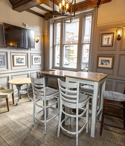 interior seating area and darts board