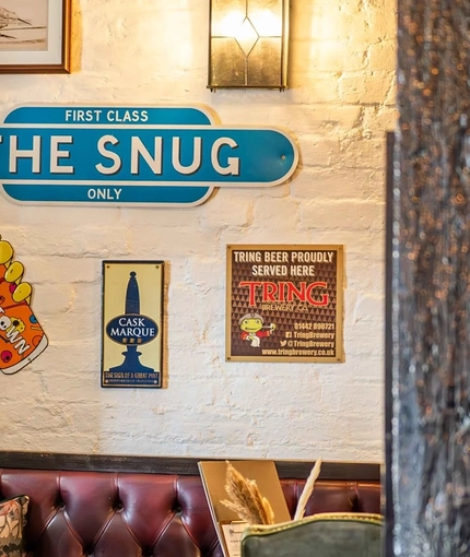 The interior restaurant seating area of Ye Olde Mitre in Barnet.