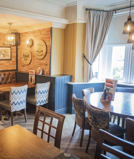 Interior dining area of a pub.