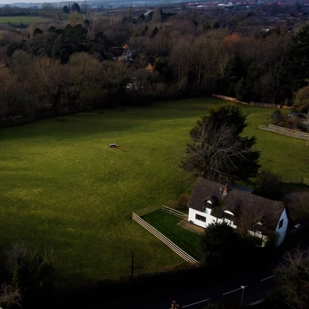 An aerial view of fields and trees near The Bell at Stratford-Upon-Avon.