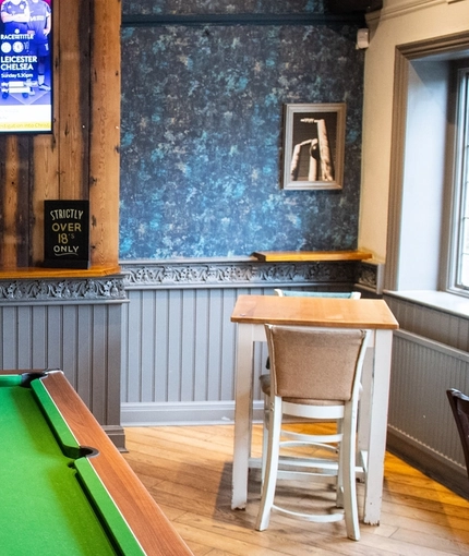 internal seating area with pool table