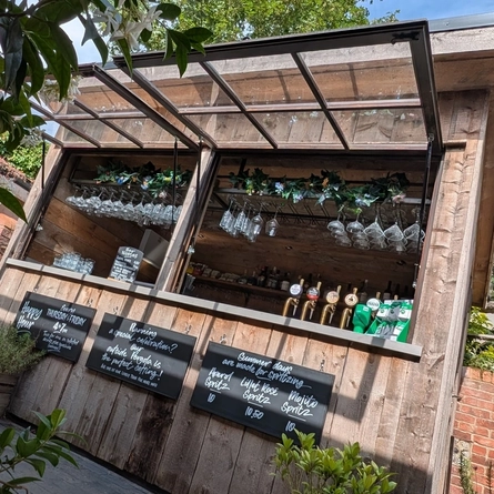An image of an exterior bar to advertise a what's on event at The Cart & Horses..
