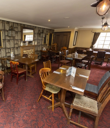Interior dining area of a pub.