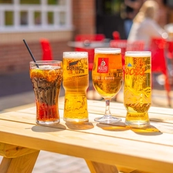 An exterior shot of drinks served in a beer garden at the Mill House in Stretton.