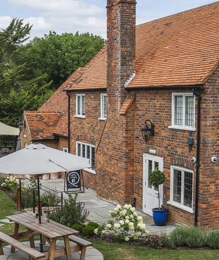 An elevated view of the exterior beer garden seating area at The Crown.
