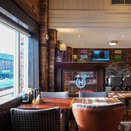 interior of the restaurant with a seating area