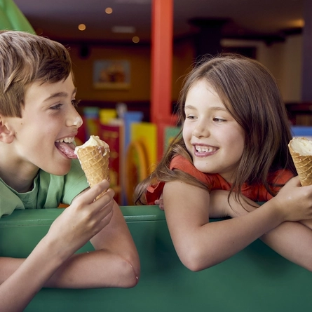 Kids enjoying ice cream at a Farmhouse Inns venue.