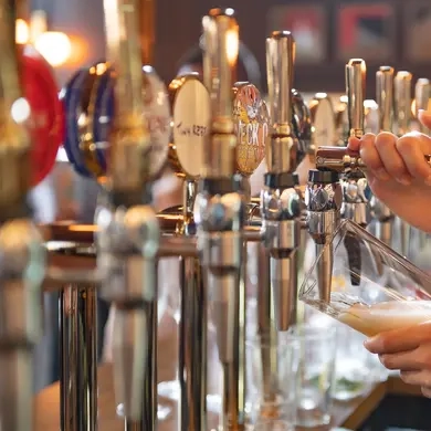 Metro - Fox & Finch (Godalming) - Bartender pouring a pint