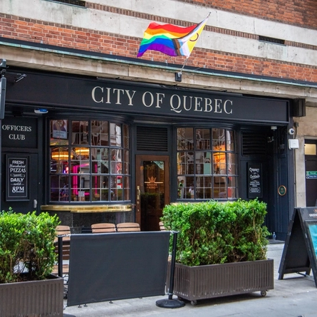 The exterior facade and beer garden seating area at The City Of Quebec.