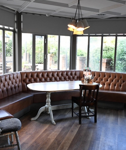 Interior dining area of a pub.