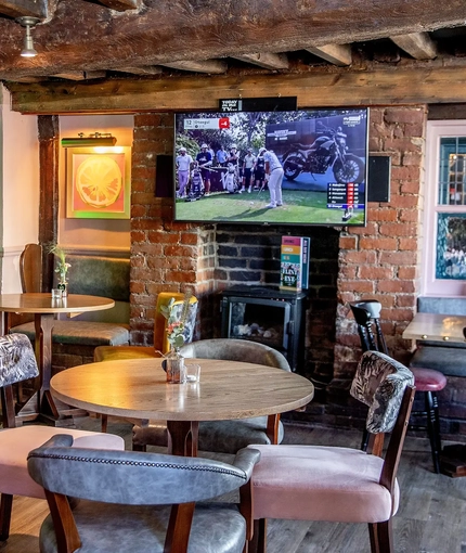 Interior seating area with bar and TV