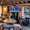 Interior seating area with bar and TV