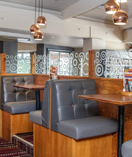 Interior dining area of a pub.