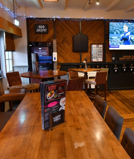 interior restaurant- with pub games and TV