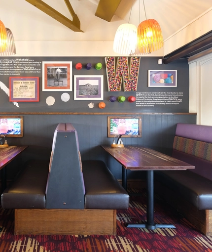 interior of the restaurant with a seating area