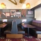 interior of the restaurant with a seating area