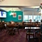 interior dining area of a pub with a TV
