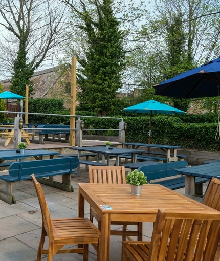 An exterior shot of the beer garden & seating area at the Sitwell Arms in Whiston.