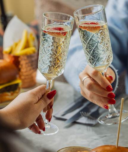 A special of burgers and prosecco served at Crafted Venues.