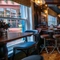 The bar and interior seating area of The Sussex Arms in Brighton.