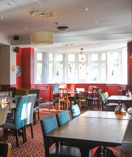 Interior dining area of a pub.