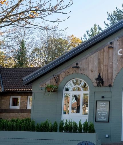The exterior facade and signage of the Clocktower in Milton Keynes.
