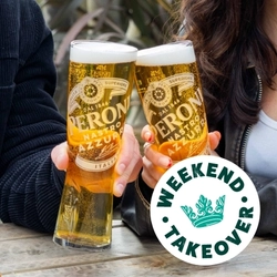 A banner of two pints of Peroni in a cheers position with a 'Weekend takeover' logo for Greene King Pubs.