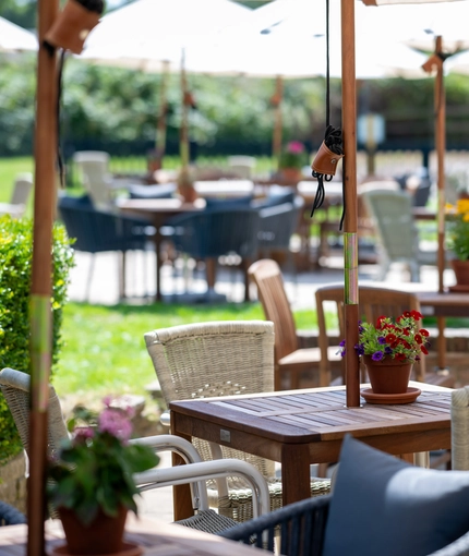 Some beer garden tables outside of the Three Horse Shoes.