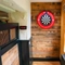 The interior games area with dart board at the Pack Horse.