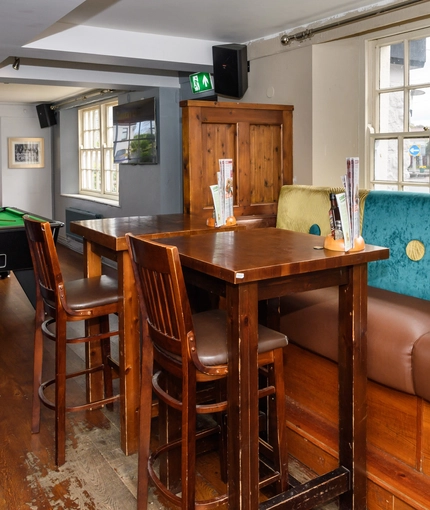 interior of the restaurant with pub games