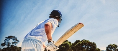 AdobeStock_Sports_Cricket_Cricketer-With-Bat_People_2022.jpeg