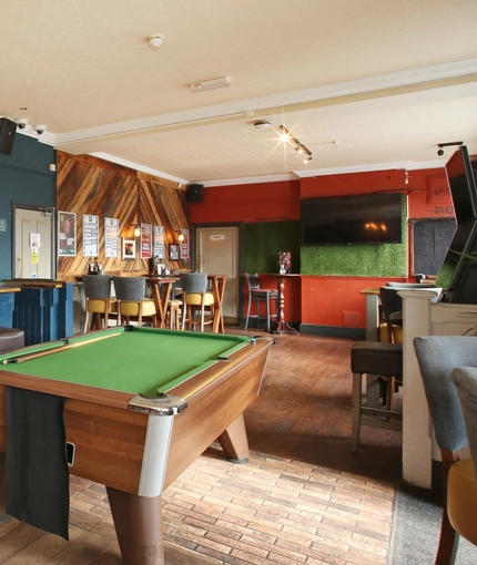 interior bar and pool area of the pub