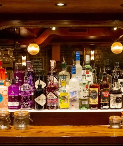 Interior bar shelf with several different spirits