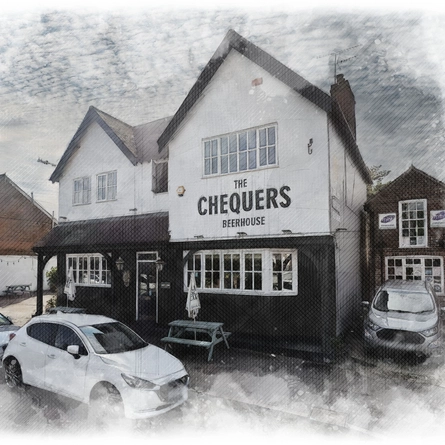 An image showing the exterior facade of the venue with outdoor seating at The Chequers.