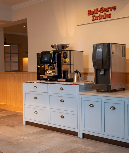 An image focusing on the interior hot & cold Self-Serve Drinks station at The Farmhouse Kitchen Willington.
