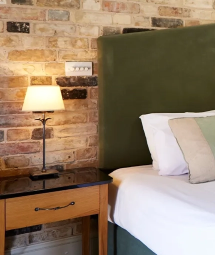 The interior hotel double bedroom with double bed at the Fox.