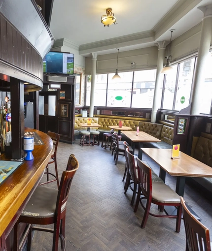 interior bar and seating area of the pub