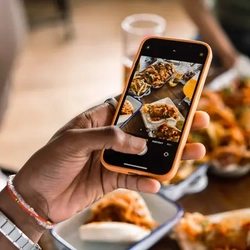 Taking a photo of a meal