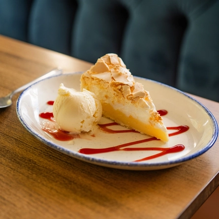A served dessert of Lemon Meringue Pie available at Hungry Horse venues.