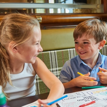 Kids colouring in at a Farmhouse Inn