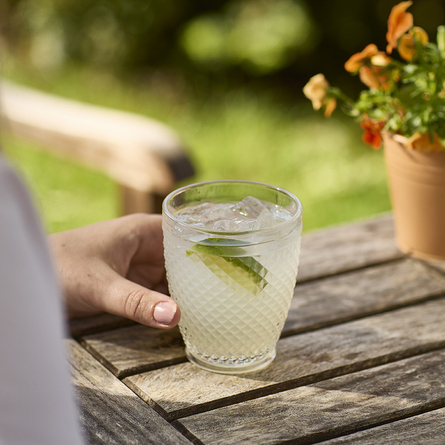 An exterior shot of summer drinks being served for the Summer Drinks Promo at Chef & Brewer venues.