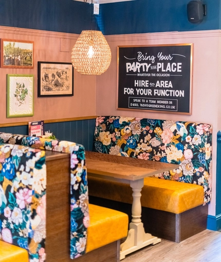 Interior seating and restaurant area of the Buff