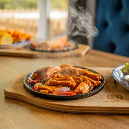 A served main of Fajitas served at Hungry Horse venues.