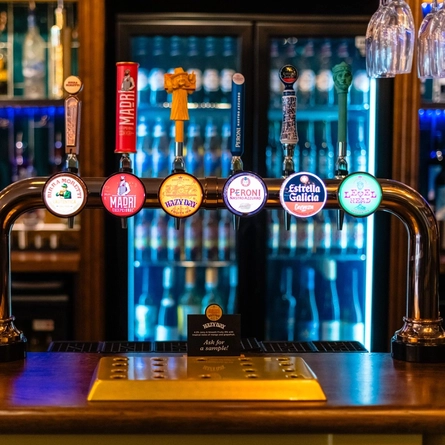 Beer fonts on the bar at the Buff.