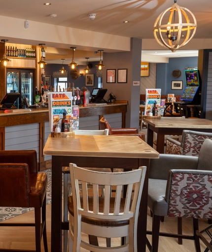 The interior restaurant and seating area with bar at the Gatehouse.