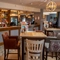 The interior restaurant and seating area with bar at the Gatehouse.