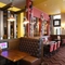 Interior dining area of a pub with a TV.